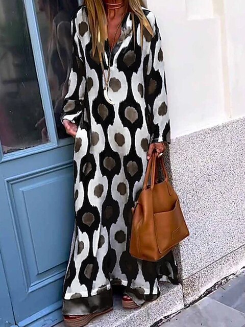 https://cdn.shopify.com/s/files/1/1039/3354/2745/files/Robe-longue-fendue-imprim-g-om-trique-floral-pour-femmes-robe-maxi-col-en-V-manches.jpg_640x640_3.jpg?v=1776280313