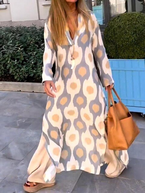 https://cdn.shopify.com/s/files/1/1039/3354/2745/files/Robe-longue-fendue-imprim-g-om-trique-floral-pour-femmes-robe-maxi-col-en-V-manches.jpg_640x640_a211e3b3-9e07-4ca2-9c40-ea1255469835.jpg?v=1776280313