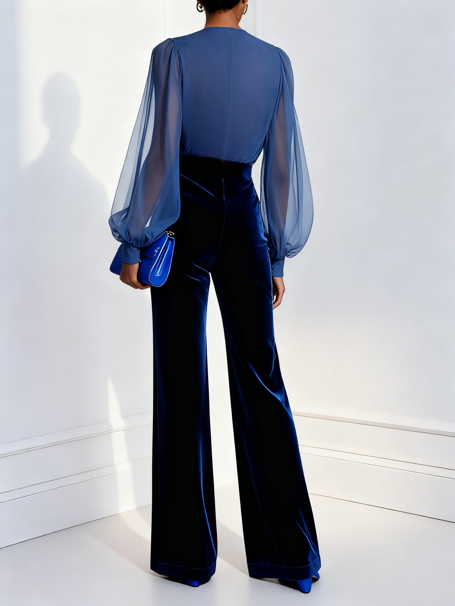 https://cdn.shopify.com/s/files/1/0938/3513/3255/files/WomenRoyalBlueMeshVNeckLongSleeveVelvetJumpsuit.png?v=1770070834