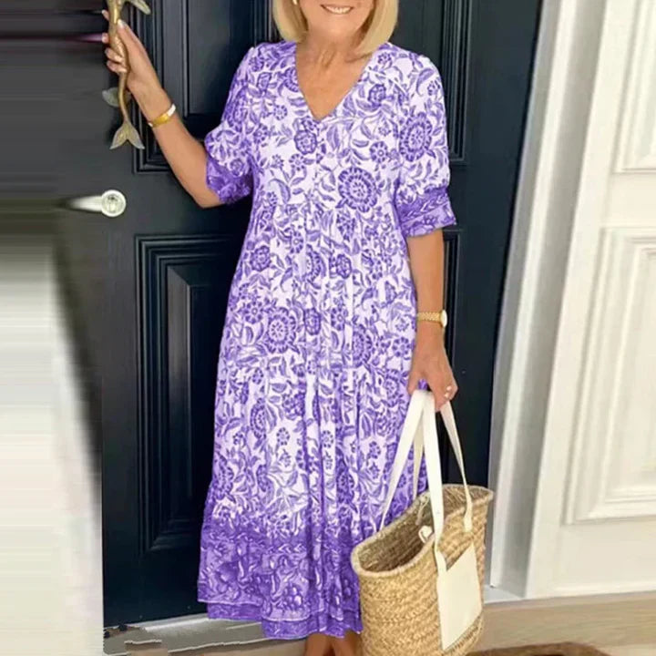 https://cdn.shopify.com/s/files/1/1039/3354/2745/files/iXeNRobe-longue-imprim-e-style-Boho-pour-femmes-tenue-de-plage-manches-courtes-d-contract-e_720x_118b442f-ebd3-4c7b-b50b-dbc72de4defc.webp?v=1776280315