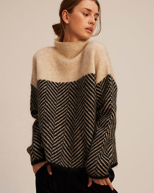https://cdn.shopify.com/s/files/1/1039/3354/2745/files/sueter-contraste-main.jpg?v=1776280474